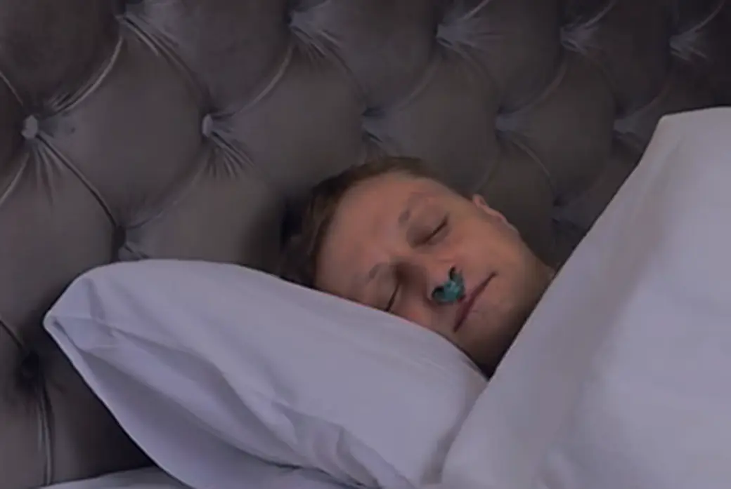 Person sleeping with Smart Nasal Ring